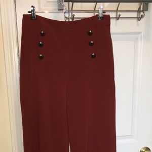 Deep rust colored wide-leg pants